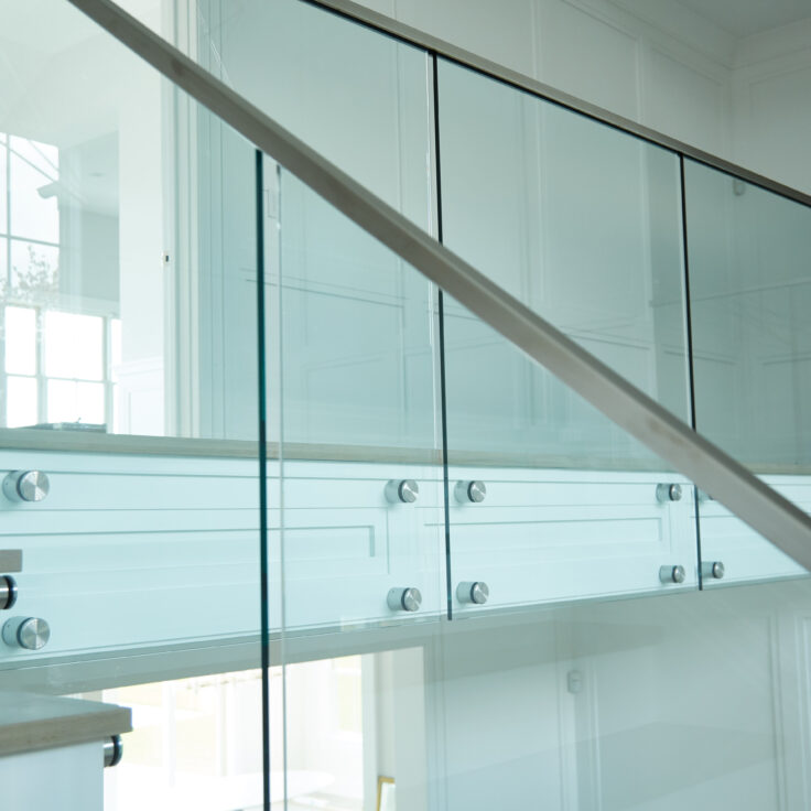 frameless glass railing on stairs