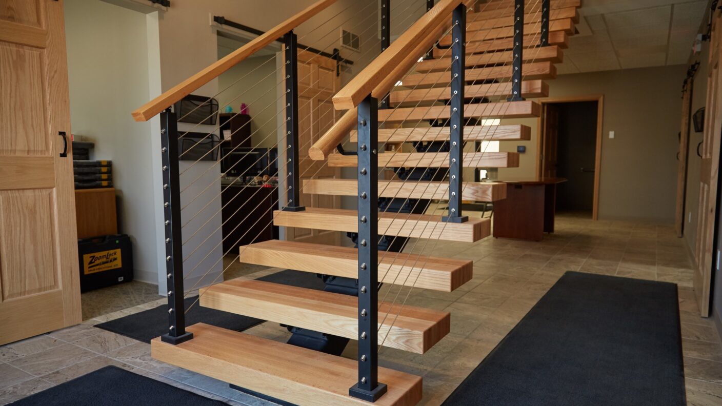 Floating Stairs with Clear Coated treads and Graspable Handrail