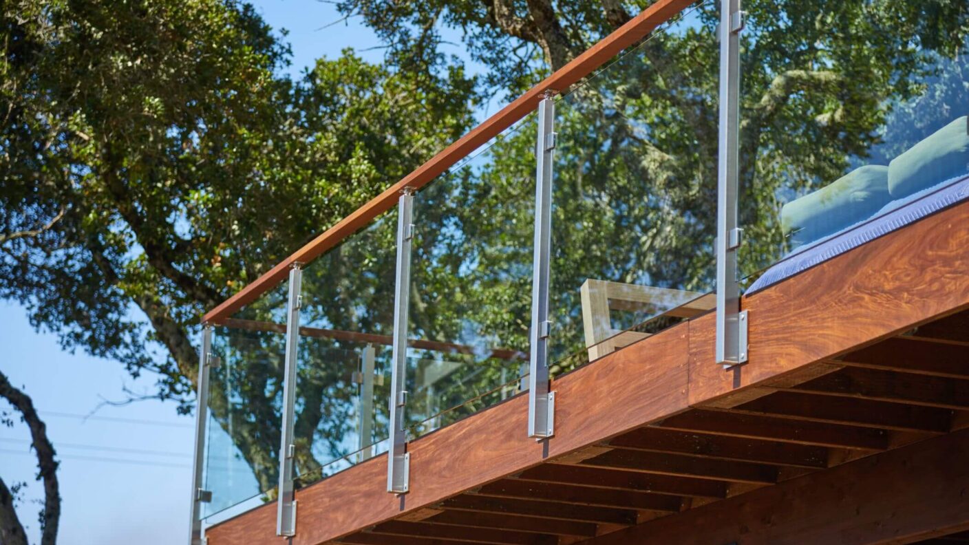 Side Mounted Posts with Glass Railing for Decks