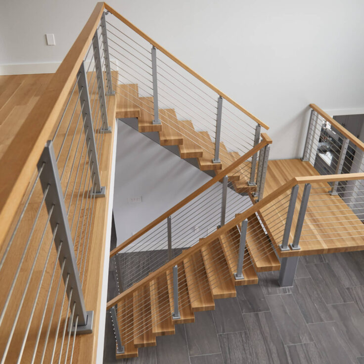 Floating stairs for indoors with rod railing