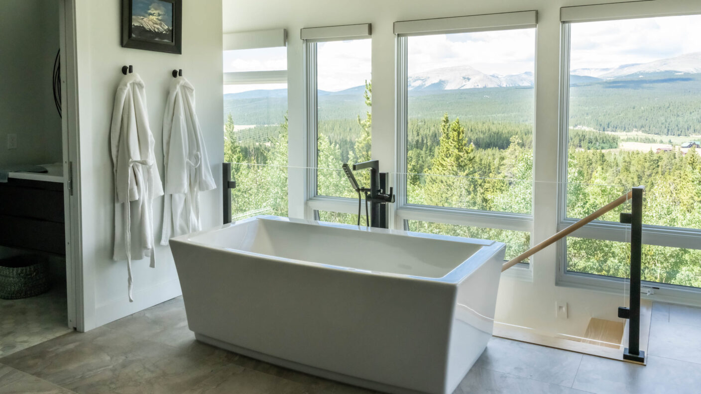 Interior Glass Railing Next to a bathtub over looking Colorado Mountains