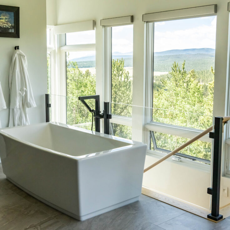 Interior Glass Railing Next to a bathtub over looking Colorado Mountains